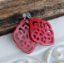 Bild von Ornament-Ohrringe aus Resin - cherry red